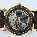 movado-triple-date-18k
