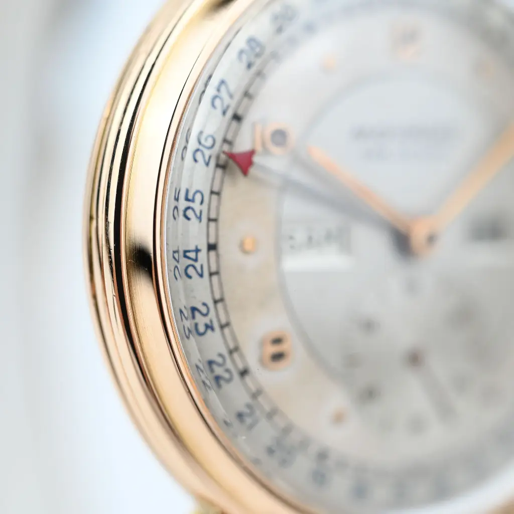 movado-triple-date-18k
